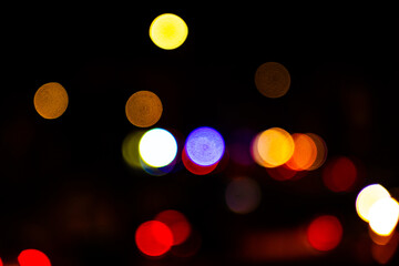 abstract image of lights of different colors with blur to create circular geometric shapes