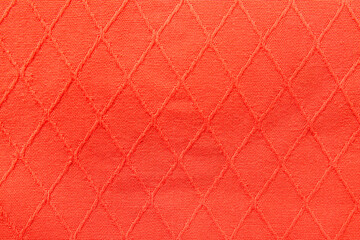 Closeup of coral fabric texture as background