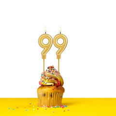 Birthday candle number 99 - Cupcake on white background