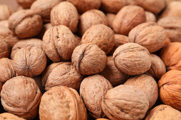 Whole walnuts as background, closeup
