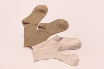 Basic color socks on beige background