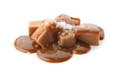 Yummy candies with caramel sauce and sea salt isolated on white