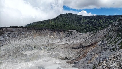 landscape of  limestone craters mountains and hills with blue sky background
