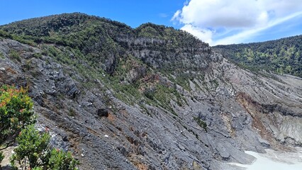 landscape of  limestone craters mountains and hills with blue sky background