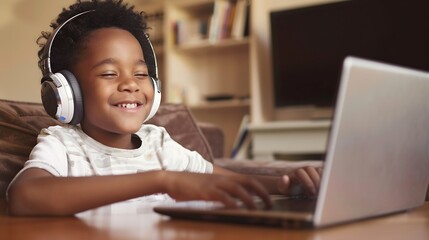 Happy african american boy sitting at table using laptop and headphones in online class at home education childhood online learning communication and domestic life unaltered : Generative AI