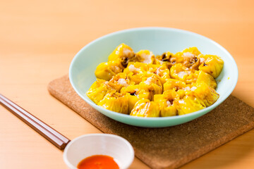 Hong Kong famous street food siu mai fish dumpling with spicy oil