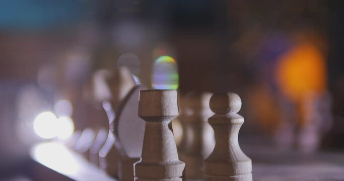 Wooden chess pieces in soft lighting with 4K focus shift create a detailed and beautiful image