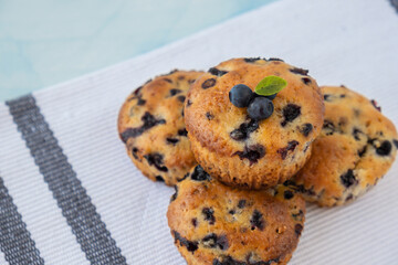 Homemade baked fresh blueberry muffins. Tasty pastry sweet cupcake dessert. Berry pie cupcakes with organic berries. Gluten free healthcare recipe from alternative flour