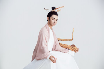 Artistic image of a Chinese priest and Taoist priest on a white background
