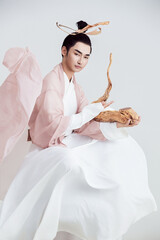 Artistic image of a Chinese priest and Taoist priest on a white background
