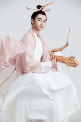 Artistic image of a Chinese priest and Taoist priest on a white background
