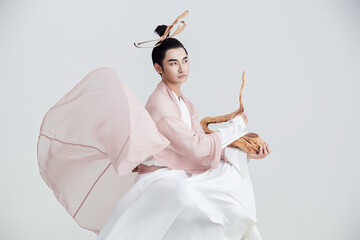Artistic image of a Chinese priest and Taoist priest on a white background