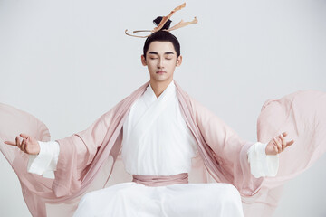 Artistic image of a Chinese priest and Taoist priest on a white background