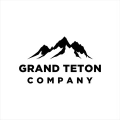 Grand teton mountain peak vector logo with masculine style design