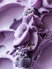 Elegant blueberry lavender gelato, a closeup of elegant blueberry lavender gelato, its purple color and floral notes highlighted against a white background