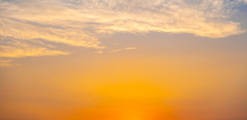 Enjoy a panoramic view of the skyline. The sun rises in the morning sky with colorful clouds. and beautiful cloud patterns In the soft light of the morning	
