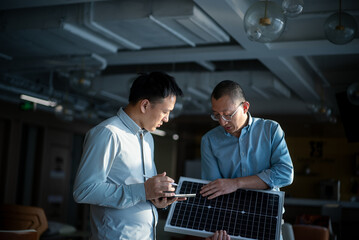 businessman coworking on solar panel