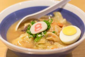 Ramen soup with boiled egg on the table