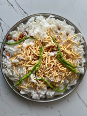Sabudana Papad or Sago Pappadam with aloo kandi  is a white crunchy big circular shape deep fried snack usually consumed during Vrat or Fast in Hindu religion.