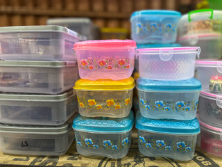 set of plastic tifffin box used to store vegetables in fridge 