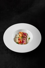 Premium Seared Tuna Tataki Dish on Elegant White Plate with Dark Background