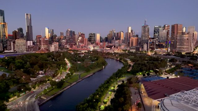 Aerial 4K footage of Melbourne CBD and the Yarra River at dawn, Victoria Australia