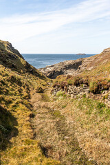 Naklejka premium Padstow Cornwall, UK. Landscape on a sunny April day. Beautiful view of the mountains and ocean.