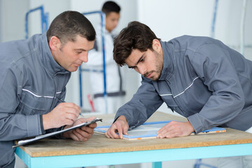 portrait of carpenters workers in workshop