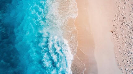 Aerial View of Turquoise Ocean Waves Meeting a Sandy Beach