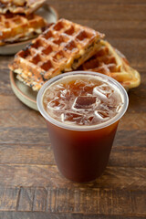 A view of an iced Americano coffee drink.