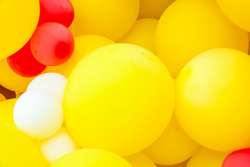 Background from colorful colored inflatable balls.