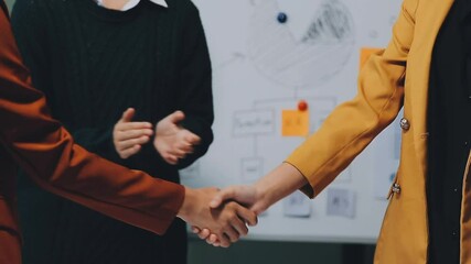 Business people, meeting and shaking hands for success, deal or advice with corporate auditor in office. Financial advisor, clients or accountant handshake for thank you with profit, stats or report