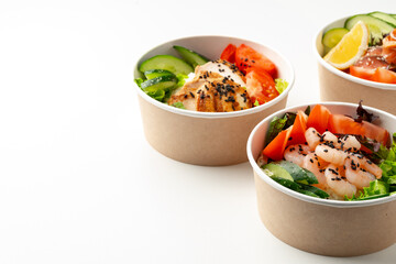 Tasty take out poke bowls isolated on white background