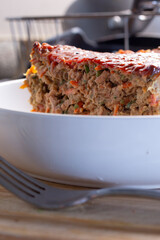 A view of a vegan meatloaf in a bowl.