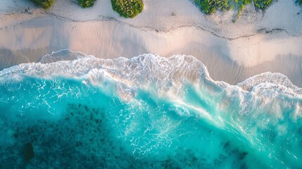 A tranquil beach with turquoise waters, captured from a birds-eye view, offering a peaceful escape
