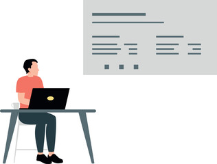 A boy is working on the laptop.