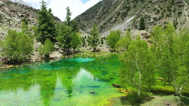 Flight over Bashkiri Lake (Rainbow Lake) in Naltar Valley, Gilgit Baltistan