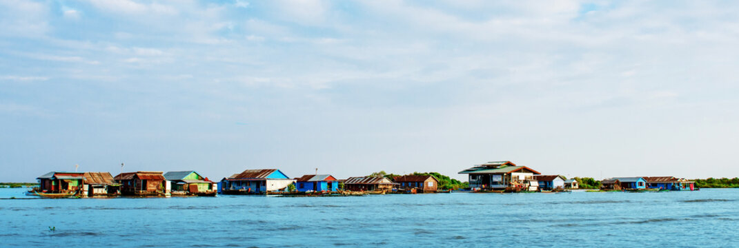 Floating village in Cambodia. Kompong Phluk. Banner of the village on the water