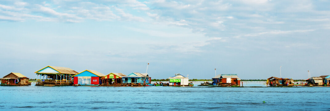 Floating village in Cambodia. Kompong Phluk. Banner of the village on the water
