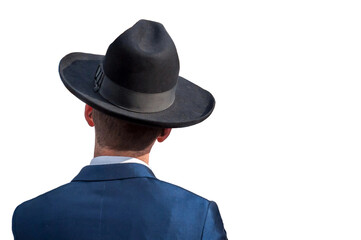 The man is dressed in traditional Jewish and Hasidic clothing. Isolated on a white background.