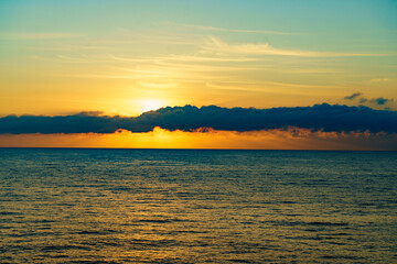 Sunrise over sea water