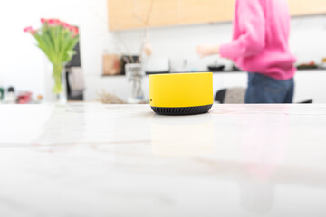 Close up photo of smart speaker able to manage home in wireless way	
