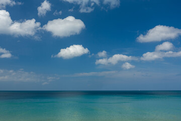 Obraz premium Amazing sea surface waves landscape background,Blue sky white clouds over sea,ocean background