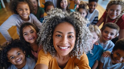Fototapeta premium Multicultural classroom, Afroamerican teacher, smiling, surrounded by children, all learning at the same time