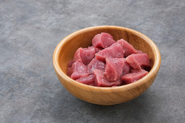 Fresh raw beef (daging sapi), food preparation.
