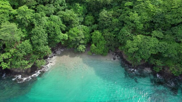 Penca Beach, Costa Rica. Beautiful Aerial Drone Flyover Ocean And Green Trees, 4K Resolution