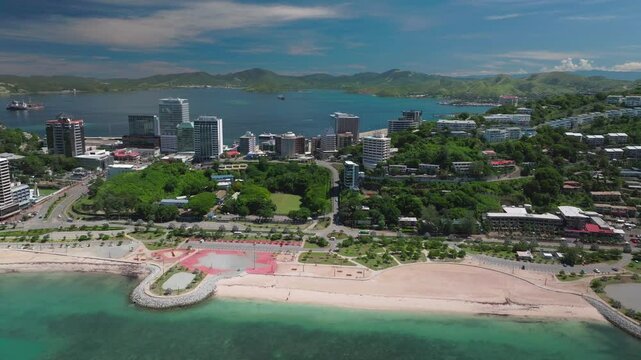 Port Moresby Hotels  Ela Beach Papa Papua New Guinea Aerial drone PNG morning sunshine Capital City Central Business District wharf Fairfax Harbour Idlers Bay Hilton Marriot Crowne Plaza upward