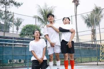 Football Players Wall Trying To Stops The Ball After Free Kick By Jumping