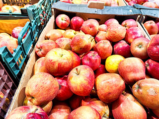 A variety of ripe apples ready for purchase. Fresh Apples Displayed for Sale at a Local Market