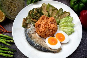 Delicious Thailand traditional food : fried rice with chili dip, pork with egg and vegetable